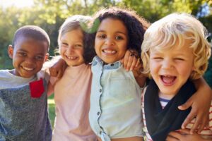 Kids enjoying outdoors with healthy smiles