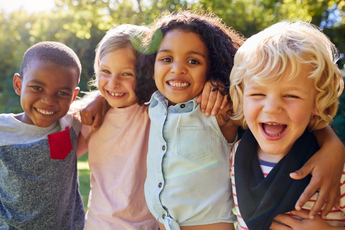 Kids enjoying outdoors with healthy smiles