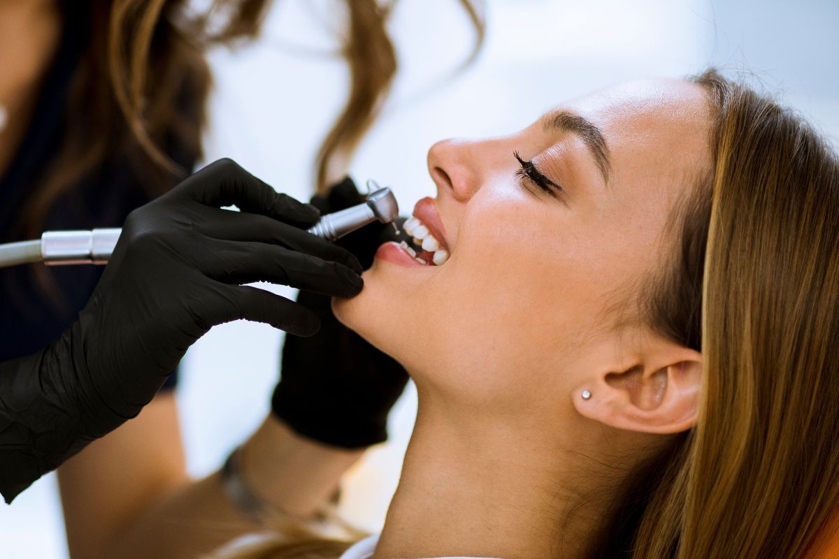 Patient receiving a professional dental exam and cleaning